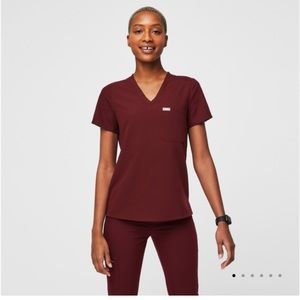 Lightly worn, small burgundy Catarina scrub top.